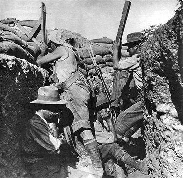 Australian light horseman using a periscope rifle, Gallipoli 1915